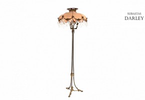 High metal floor lamp and fabric shade and glass medallions.