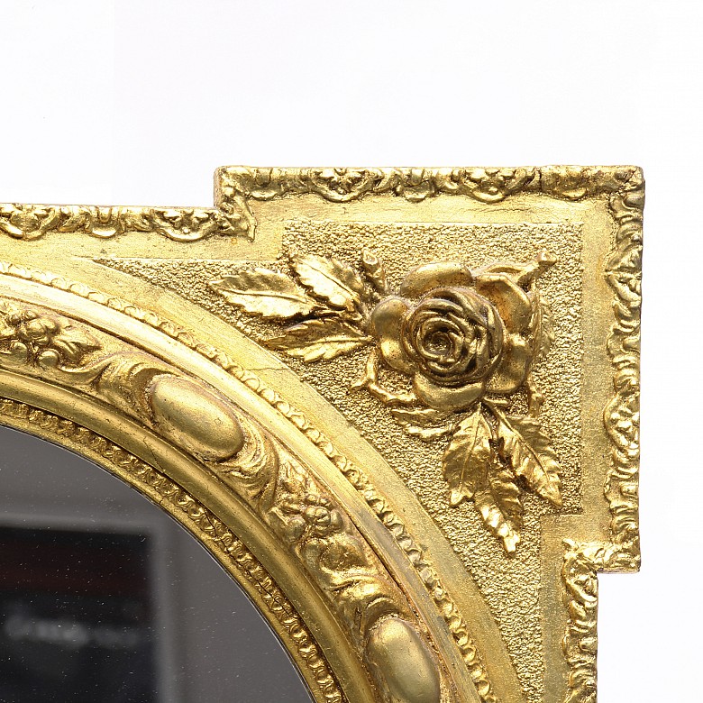 Pareja de espejos de madera tallada y dorada, pps.s.XX