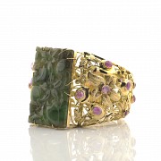 Rigid bangle in 14k yellow gold, jade and sapphires.