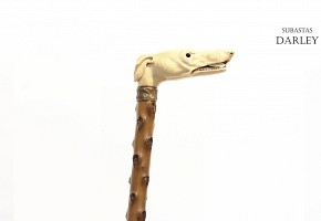 Wooden cane with ivory handle.