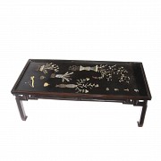 Chinese table with appliqués on the top, 20th century