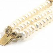 Pearl bracelet in 18k yellow gold