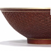 Carved and red-enameled porcelain bowl, Qing dynasty.