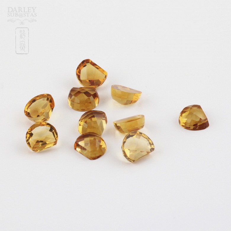 Lot 10 11.50cts citrines honey colored