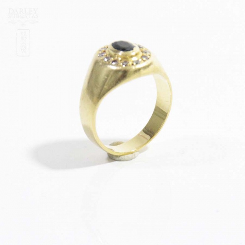 18k yellow gold seal ring with sapphire and diamonds.