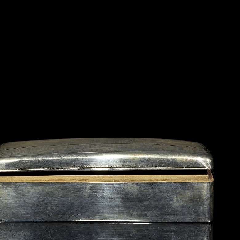 Silver box with decorations