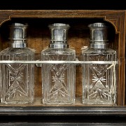 Set of three decanters with wooden box