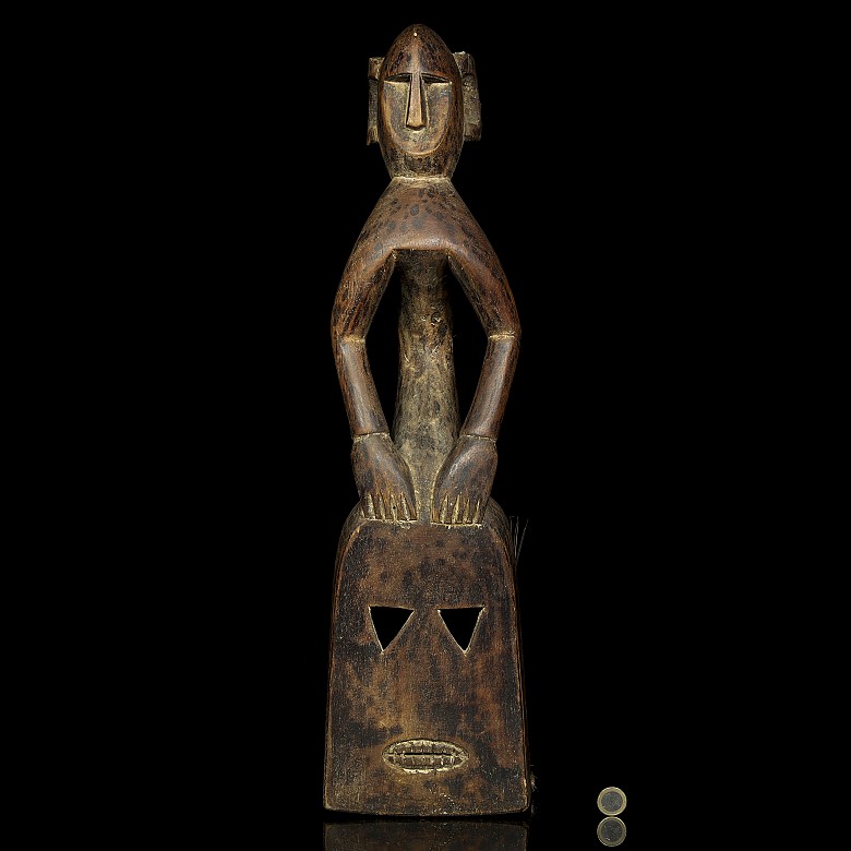 Carved wooden mask sculpture, 20th century