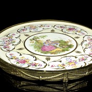 Set of decorative plates, with frame, 20th century