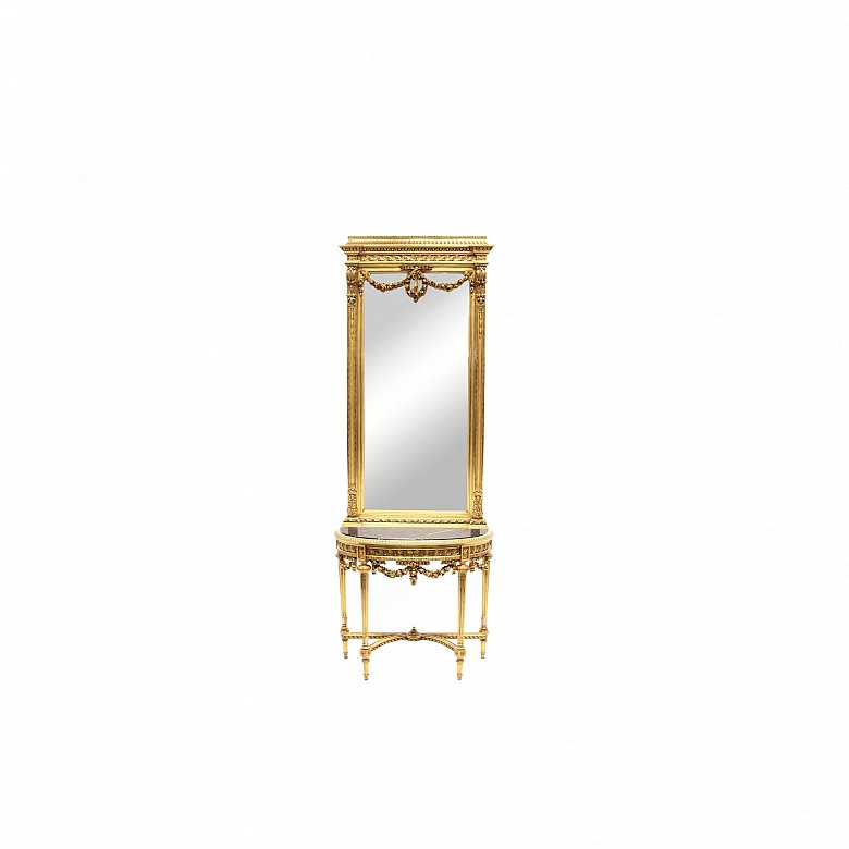 Consola y espejo de estilo Luis XVI de madera tallada y dorada, ffs.s.XIX