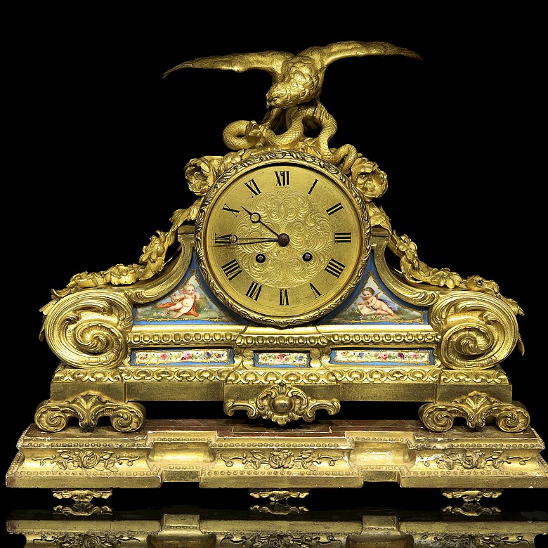 Mantel clock in bronze and porcelain, France, 19th century.