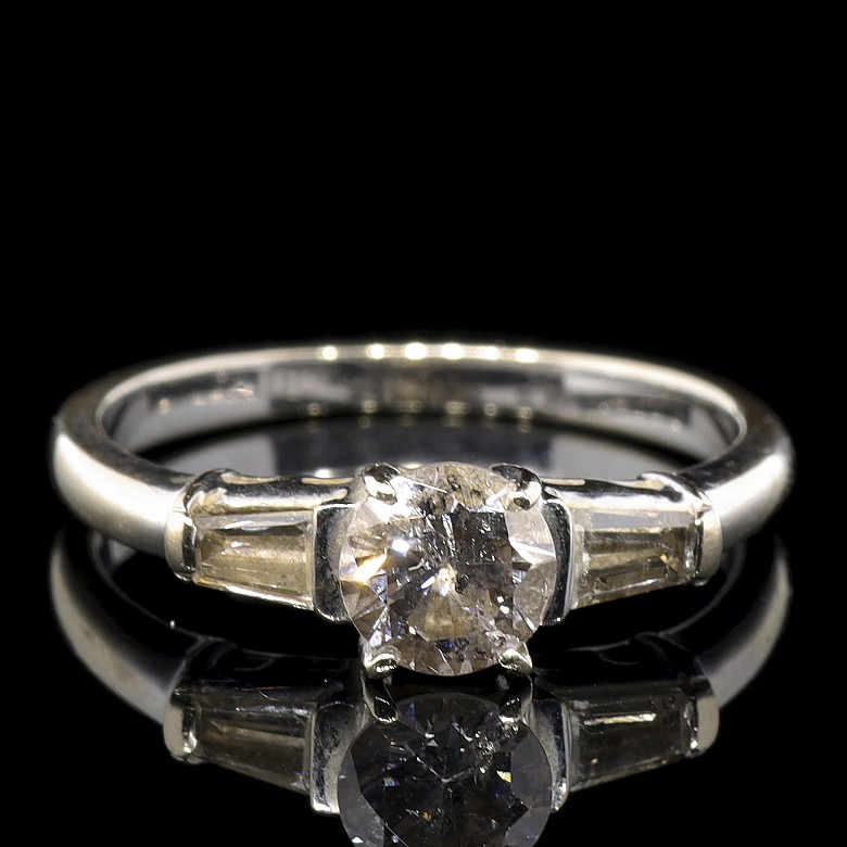 18k white gold solitaire with diamonds