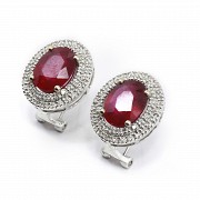 Earrings in 18k white gold with rubies and diamonds.