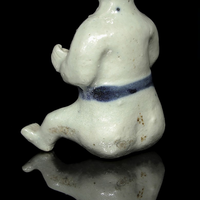 Blue-and-white ceramic figure 