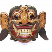 Three carved wooden topeng masks, 20th century