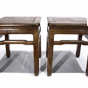 Pair of carved wooden stools, 20th c.