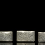 Three silver embossed boxes