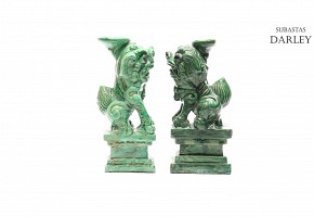 A pair of porcelain green-glazed Foo Lions.