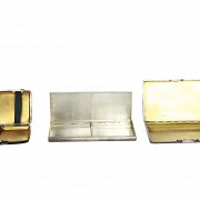 Pair of cigarette cases and a makeup powder box, English silver.