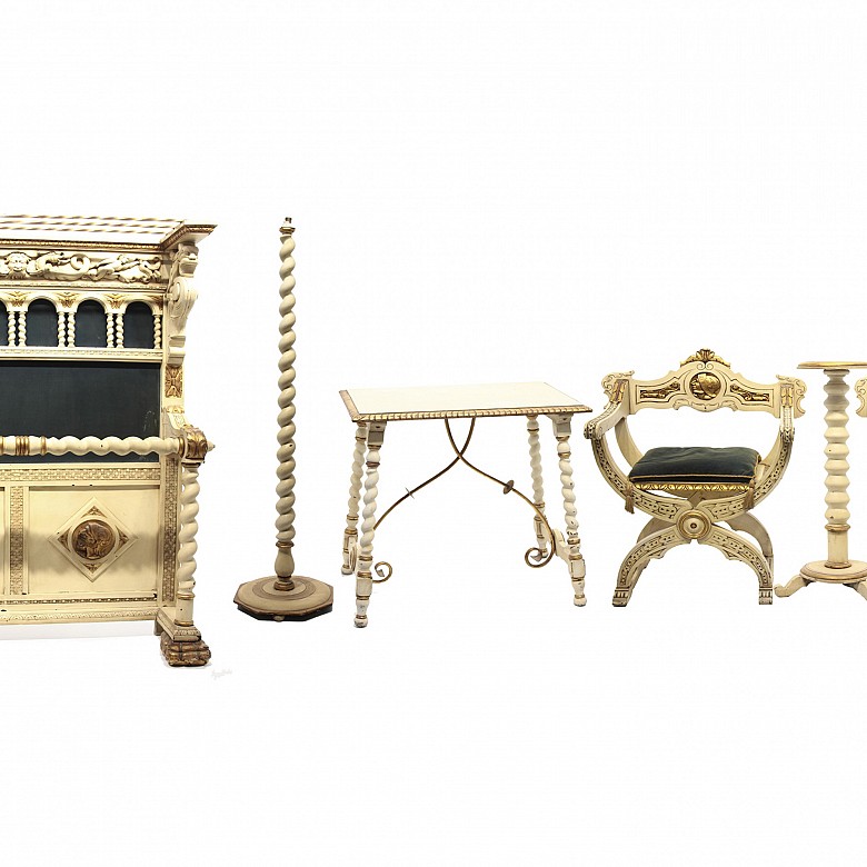 Group of furniture in white and gold.