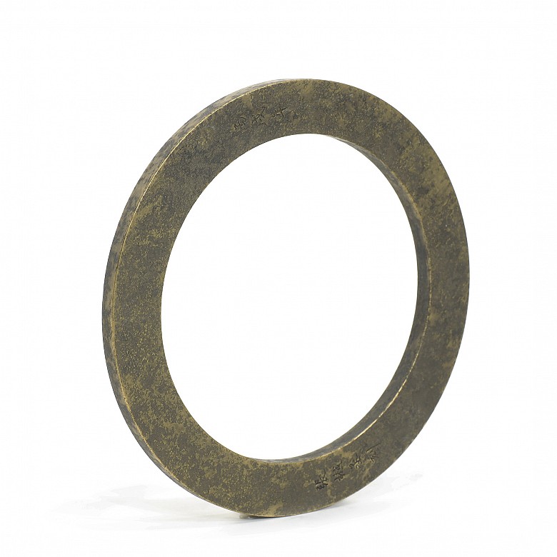 Gilded metal ring with characters, 20th Century