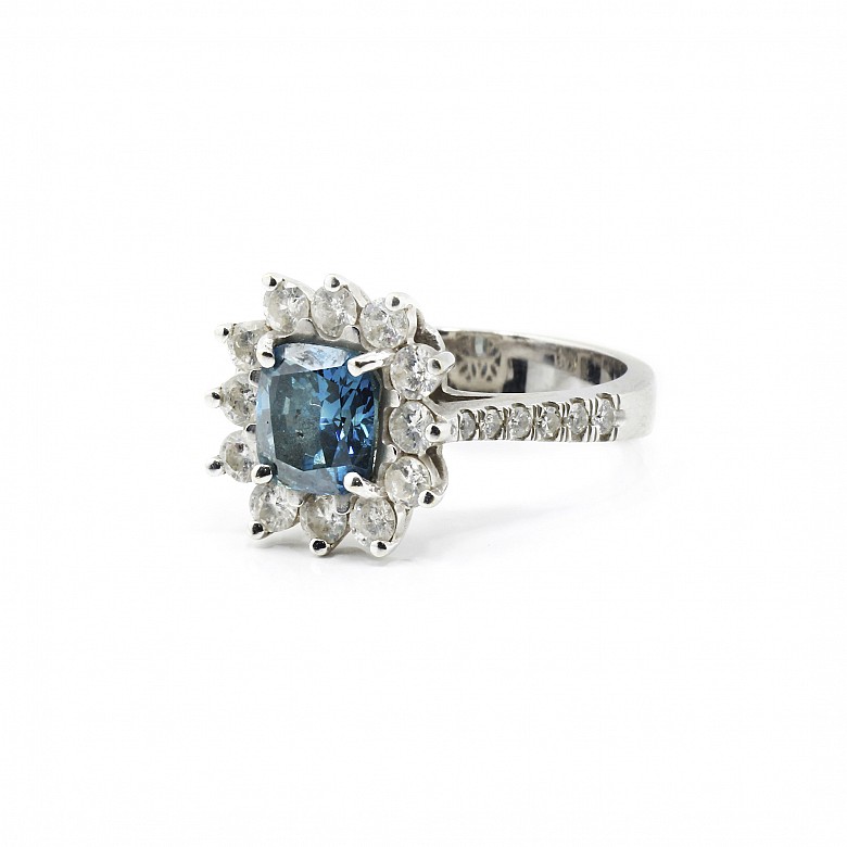 18k white gold ring with blue Fancy diamond.