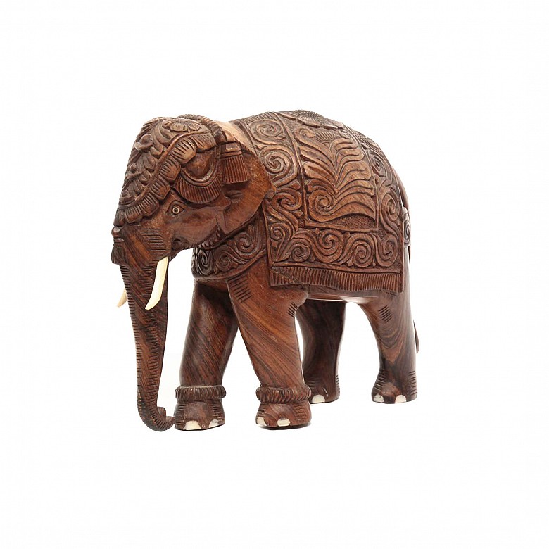 A carved wood elephant.