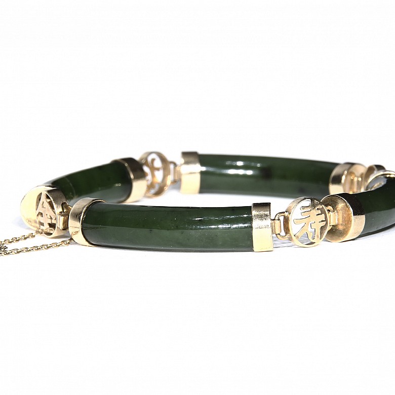 Jade and 14k gold bracelet.