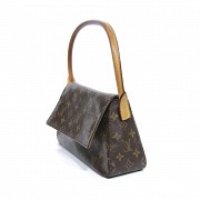Bolso de mujer Louis Vuitton de lona.