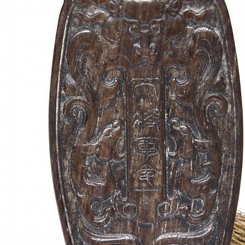 Carved wooden plaque, 20th century