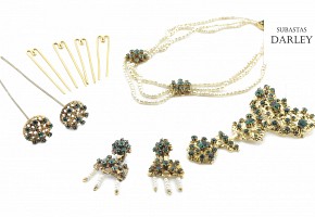 Fallera's adornments in gold metal and green stones
