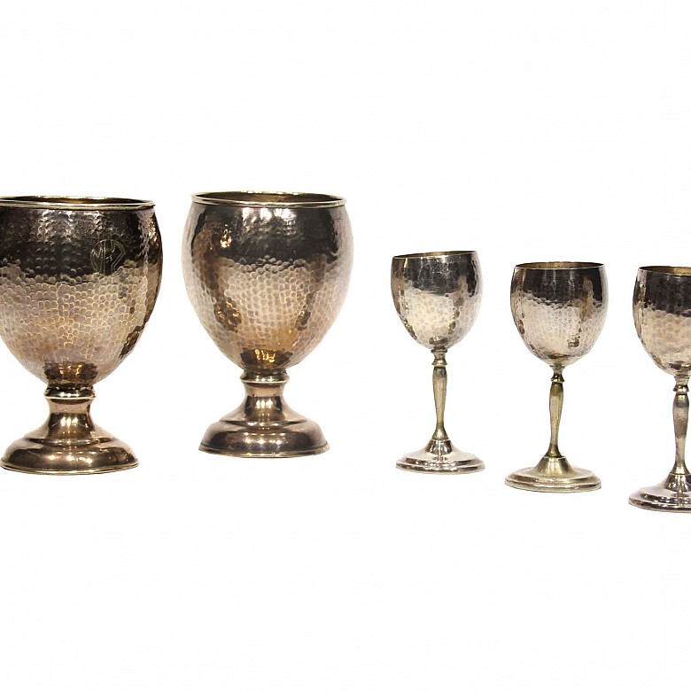 Pair of chalices y three liqueur cups. Marks: Switzerland and 900.