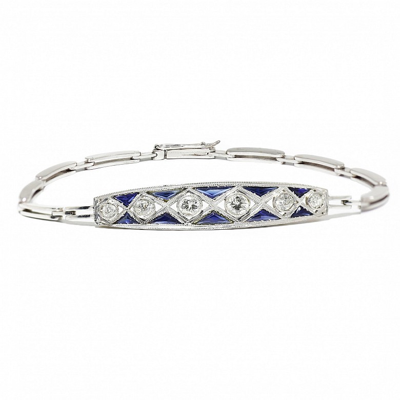 Bracelet with brilliant and sapphire front calibrated in platinum and links in 18k white gold