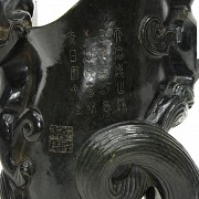 Carved jade libation cup, with Qianlong seal.