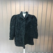Short astrakhan fur coat,