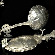 Set of decorative German silver spoons, 19th century