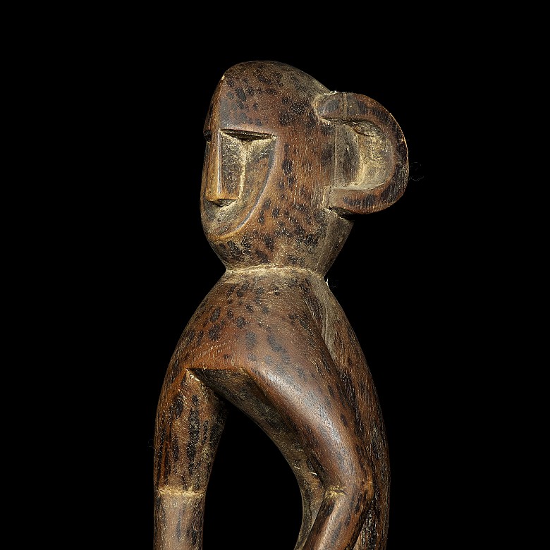 Carved wooden mask sculpture, 20th century