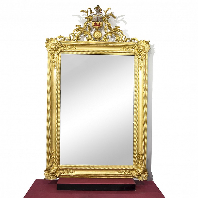 Large carved and gilded wooden mirror with pompadour, 19th century