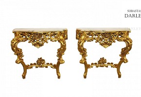Pair of carved and gilded wooden consoles, 20th century
