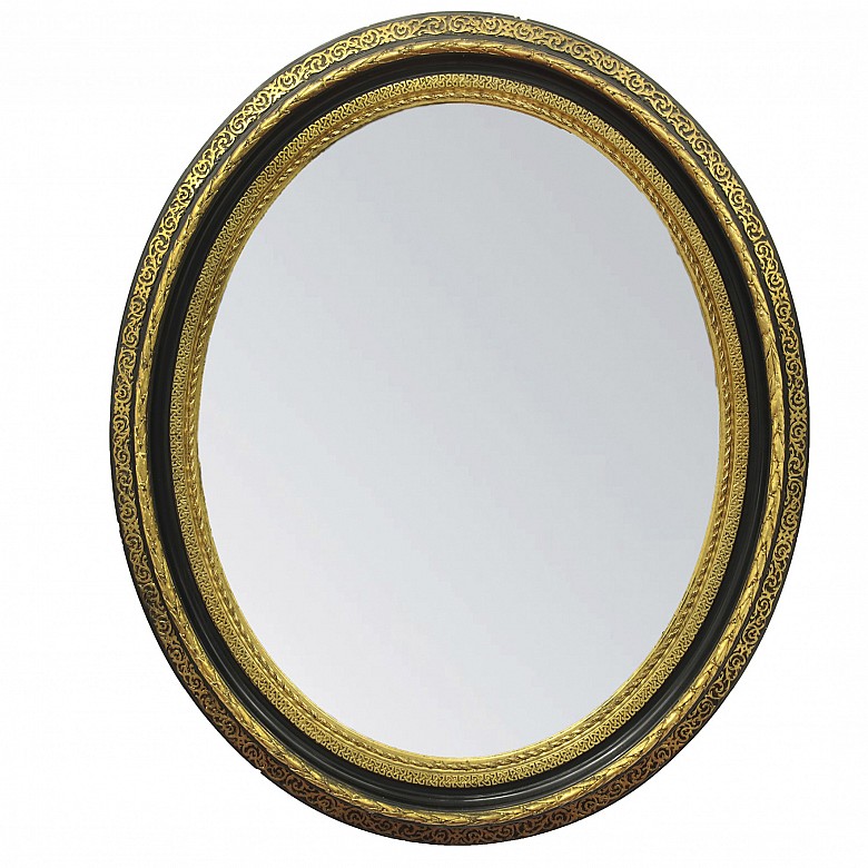 Mirror with motifs in relief, early 20th century