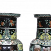 Pair of Chinese black family vases, Qing dynasty.