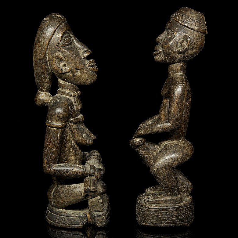 Two African carved wooden figures, Yoruba style, 20th century