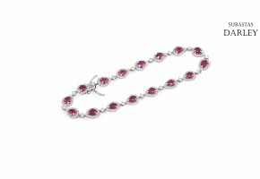 18k white gold bracelet with rubies and diamonds.