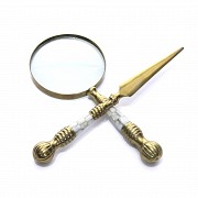 Magnifying glass and letter opener in bronze and mother-of-pearl.