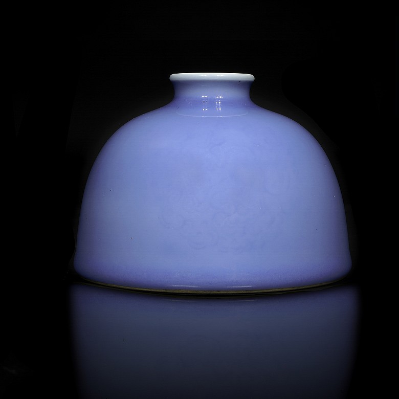 A blue-glazed water pot with 