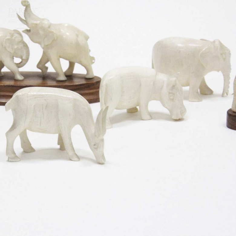 9 ivory figures - 8
