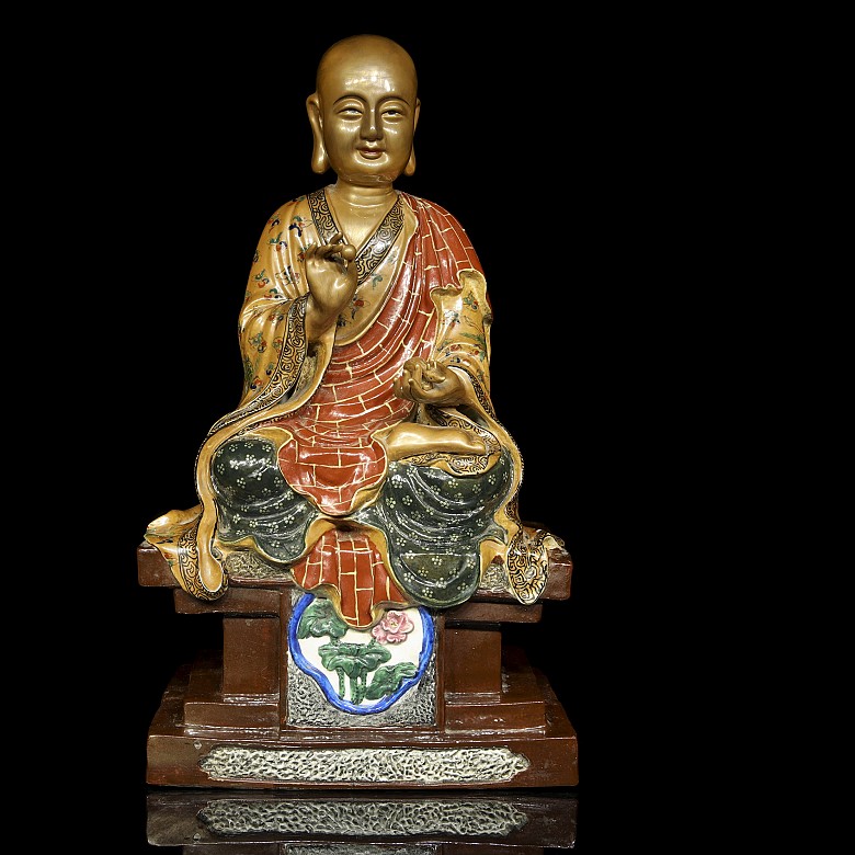 Porcelain Buddha with signature 