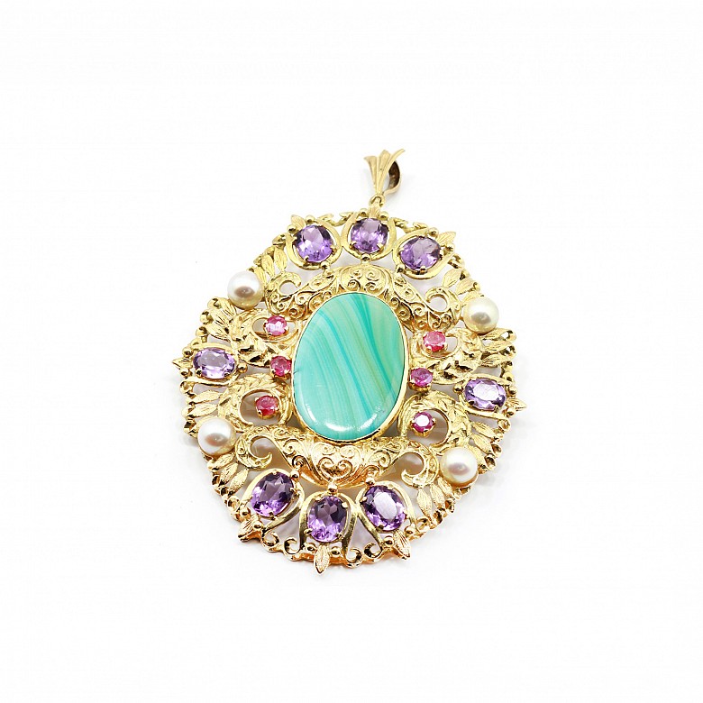 14k yellow gold medallion, blue agate, amethysts, sapphires, pearls and gems.