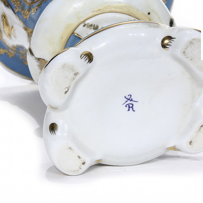 Pair of European porcelain lidded vases, 20th century