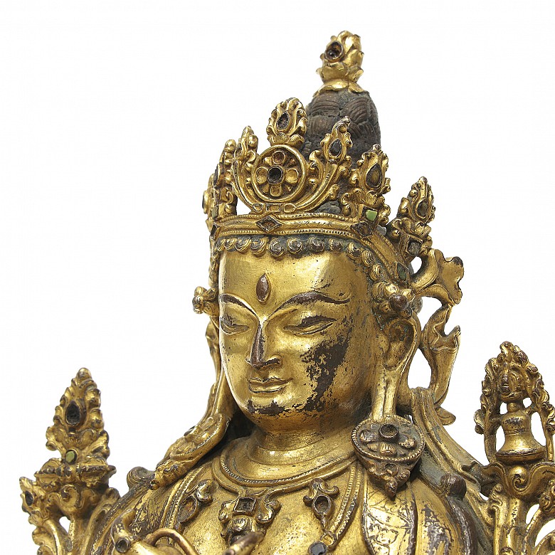 A gilt-bronze figure of 